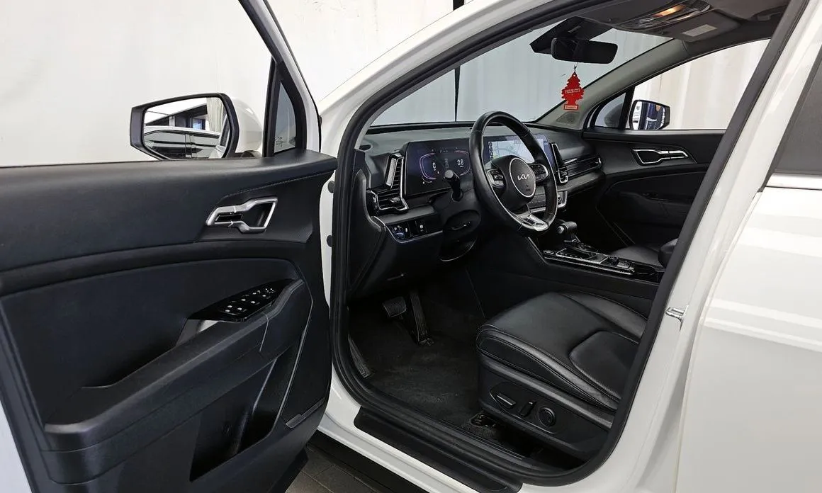 Kia Sportage — фото 9