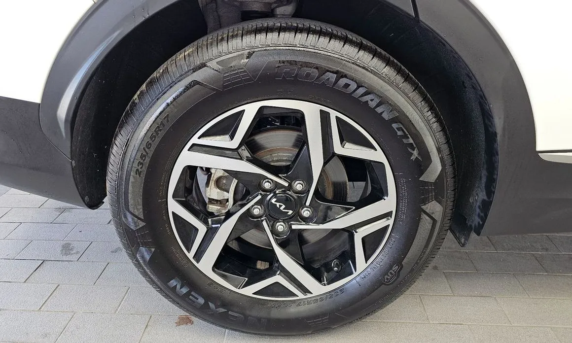 Kia Sportage — фото 10