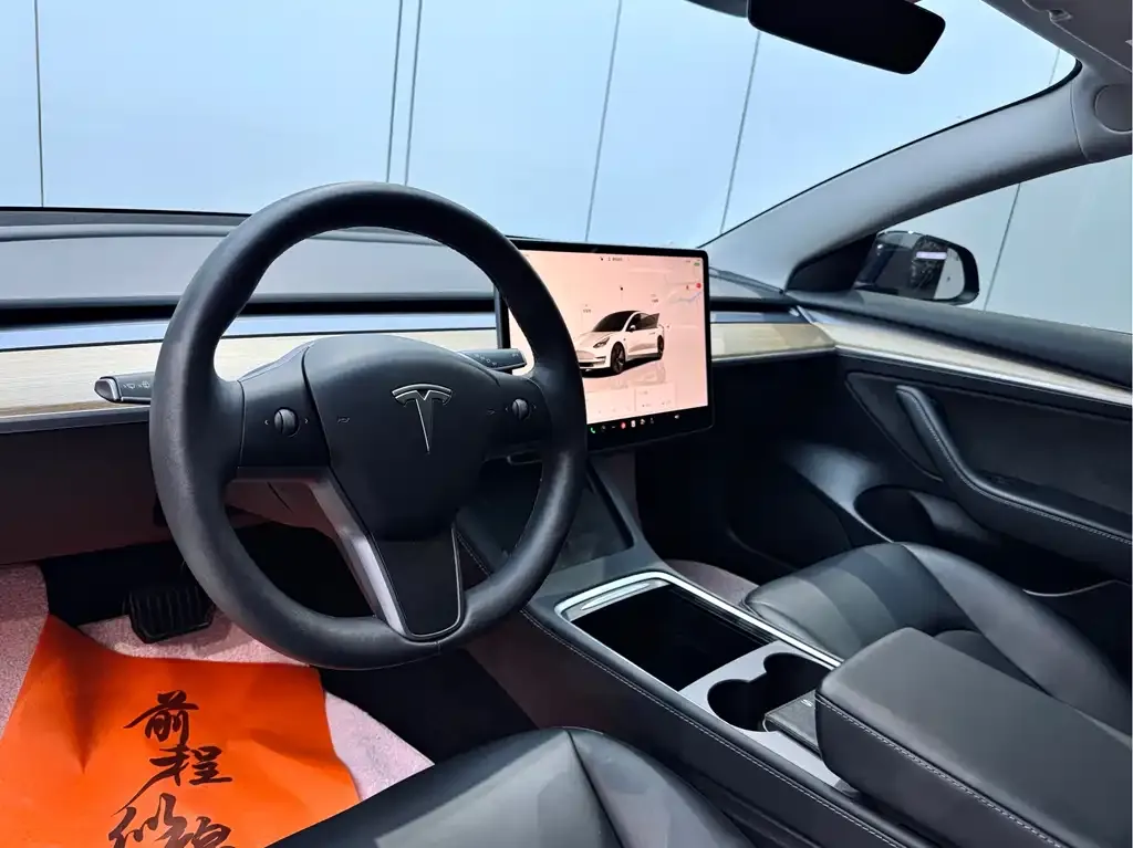 Tesla Model 3 — фото 6