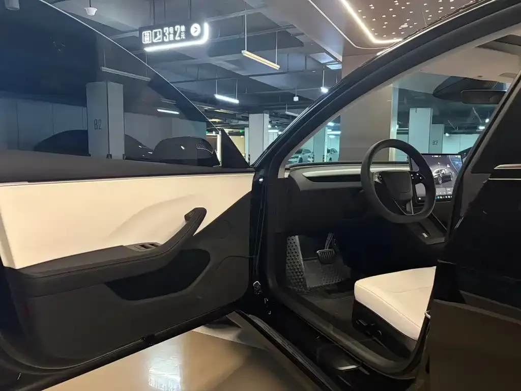 Tesla Model 3 — фото 9