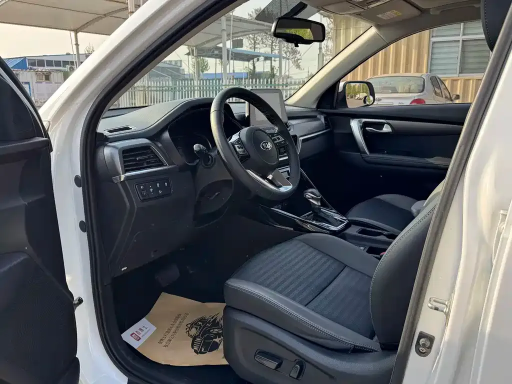 Kia Sportage — фото 9
