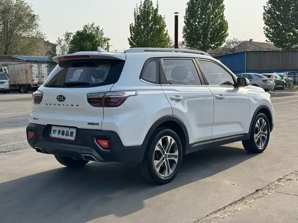 Kia Sportage — фото 8