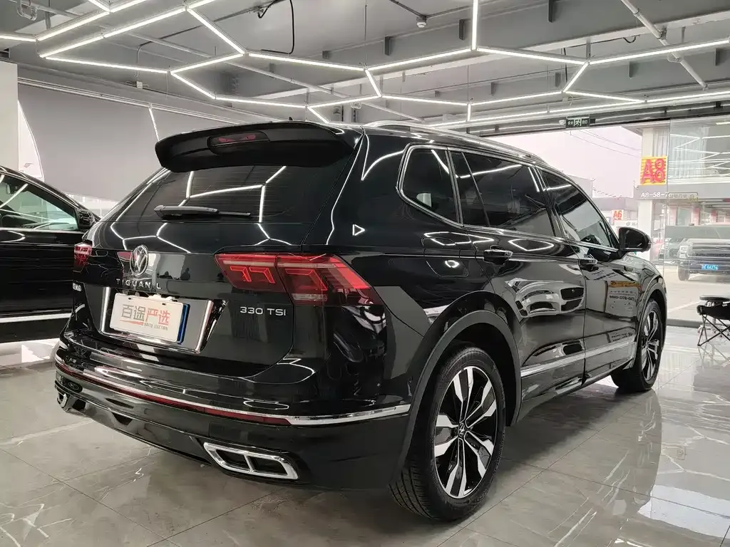 Volkswagen Tiguan L — фото 3