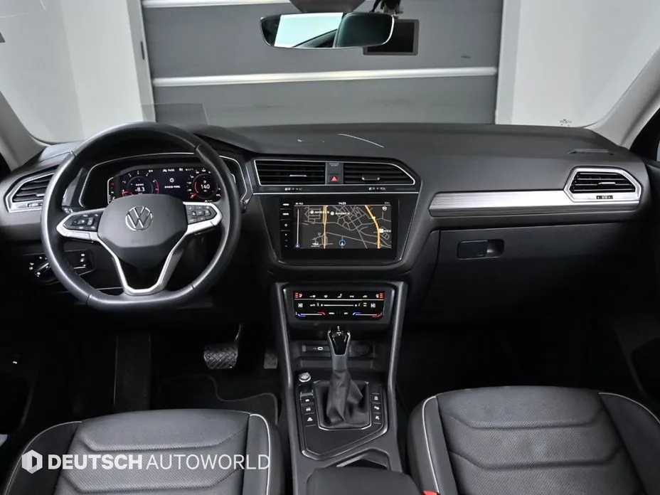 Volkswagen Tiguan — фото 10