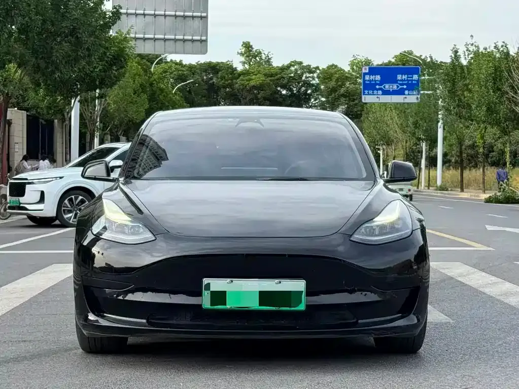 Tesla Model 3 — фото 4