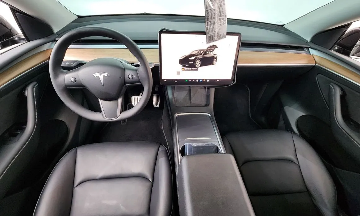 Tesla Model Y — фото 5