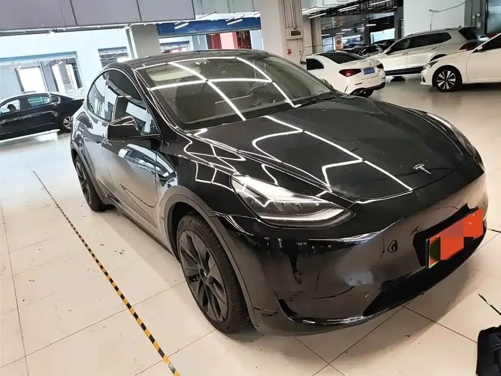 Tesla Model Y — фото 6