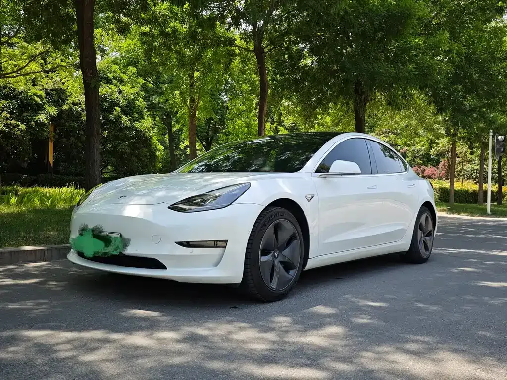 Tesla Model 3 — фото 7