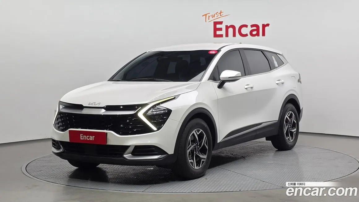 Kia Sportage — фото 1