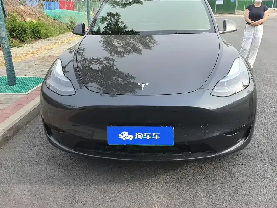 Tesla Model Y — фото 10