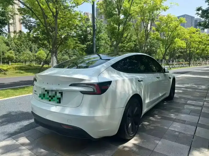 Tesla Model 3 — фото 7