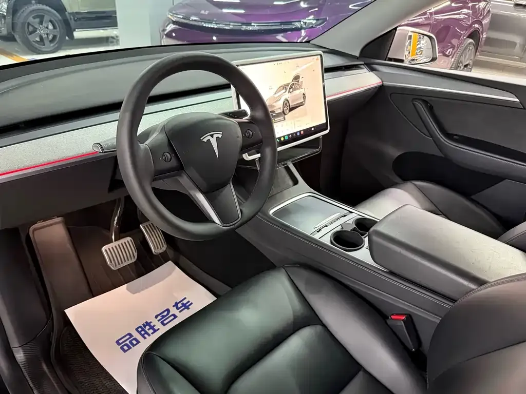 Tesla Model Y — фото 7