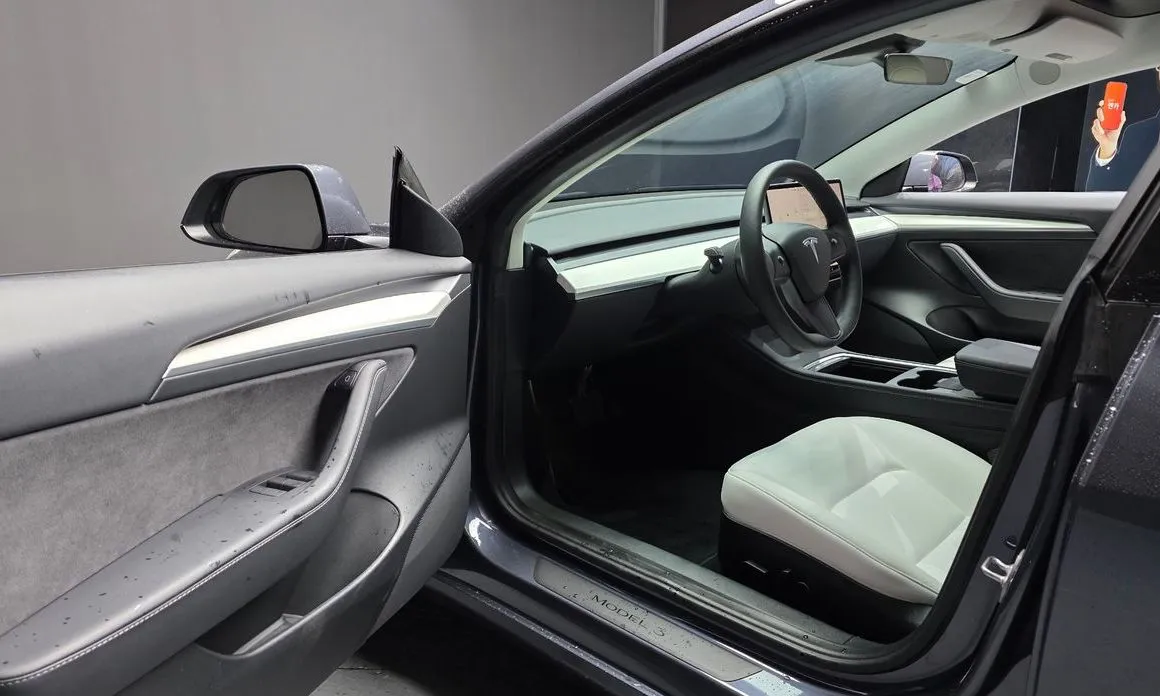 Tesla Model 3 — фото 8