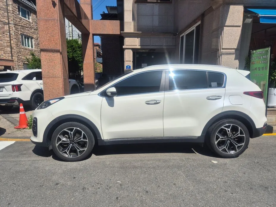 Kia Sportage — фото 7