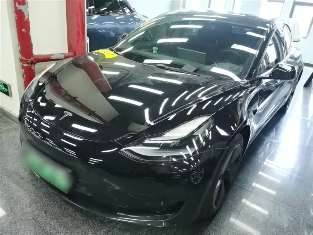 Tesla Model 3 — фото 9