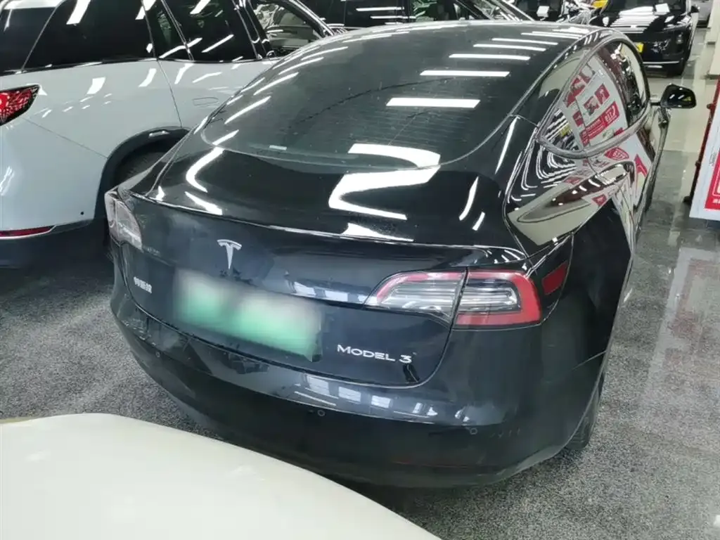 Tesla Model 3 — фото 5