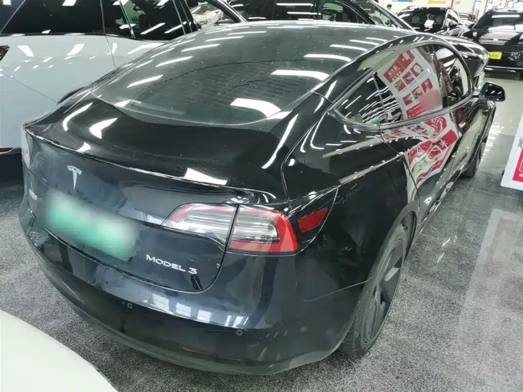 Tesla Model 3 — фото 10