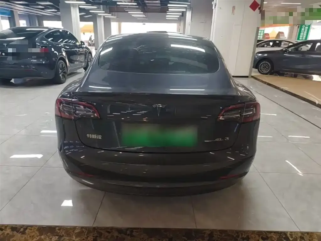 Tesla Model 3 — фото 10