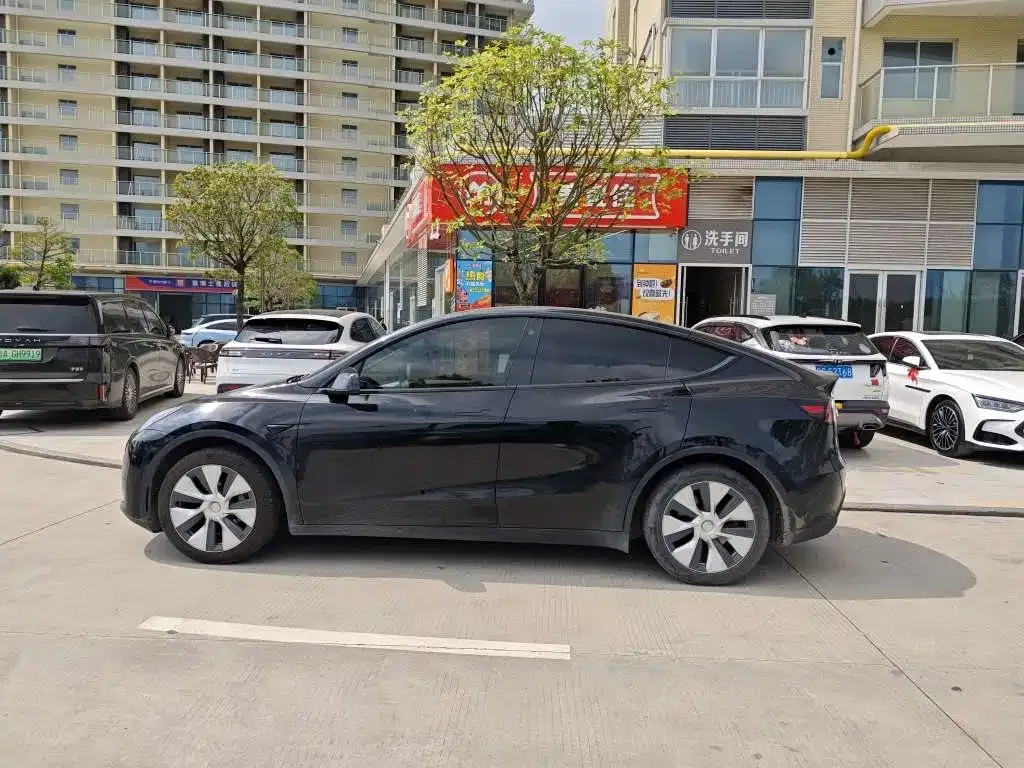 Tesla Model Y — фото 7