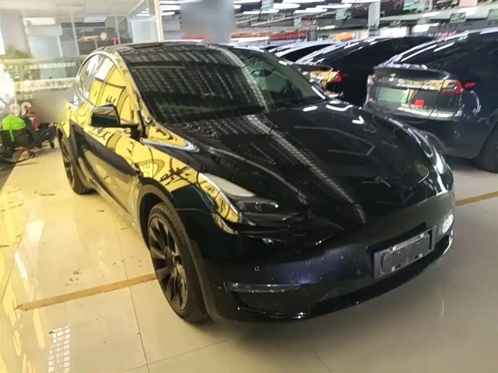 Tesla Model Y — фото 8