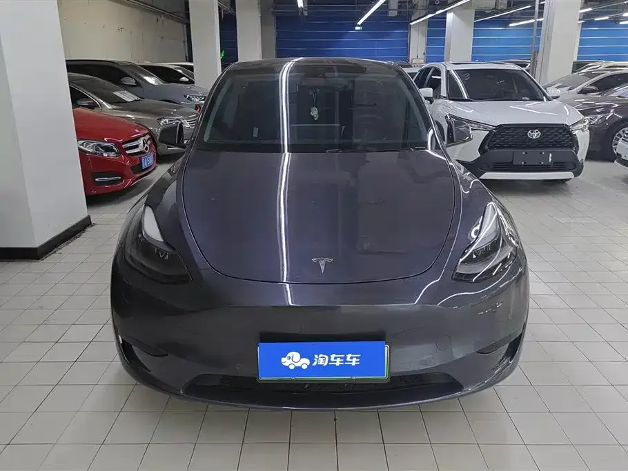 Tesla Model Y — фото 10