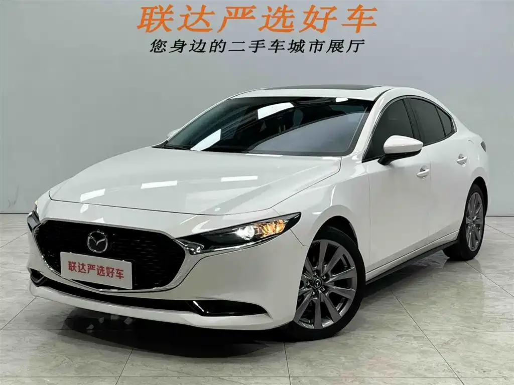 Mazda 3 Axela — фото 1