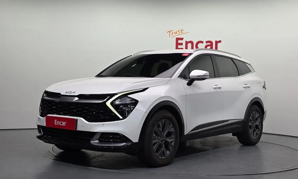 Kia Sportage — фото 1