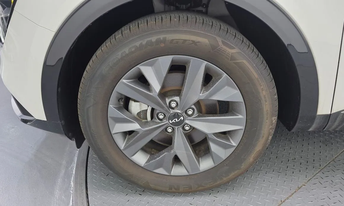 Kia Sportage — фото 10