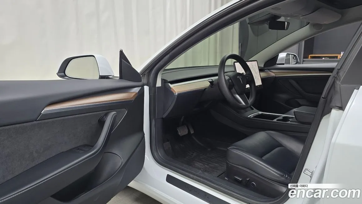 Tesla Model 3 — фото 9
