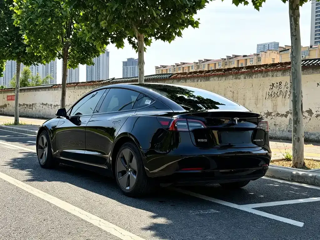 Tesla Model 3 — фото 7