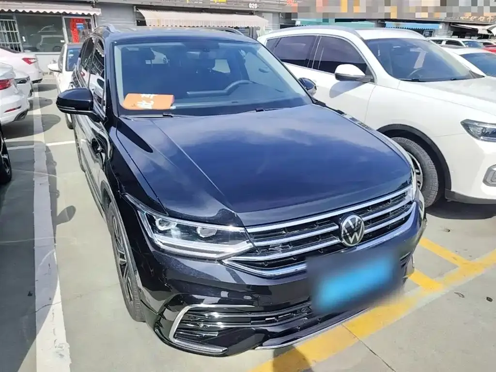 Volkswagen Tiguan L — фото 9