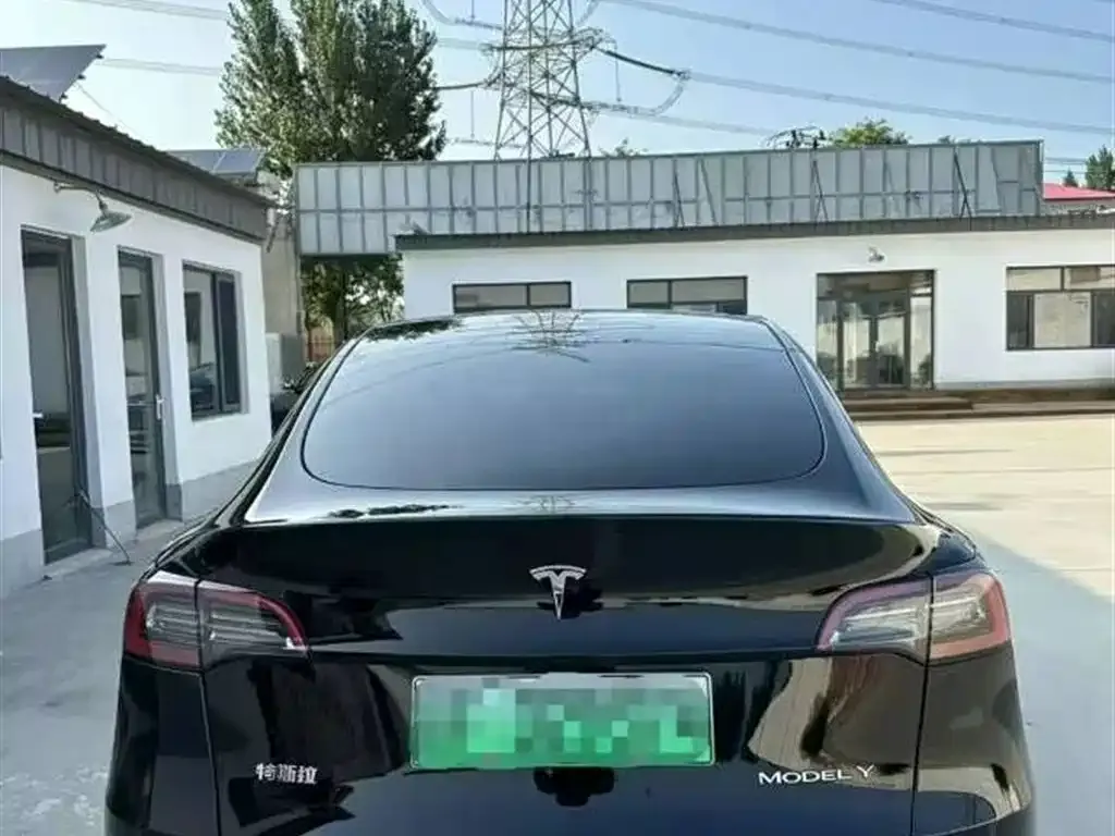 Tesla Model Y — фото 7