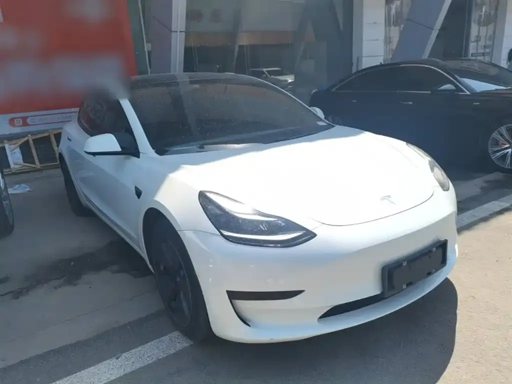 Tesla Model 3 — фото 9
