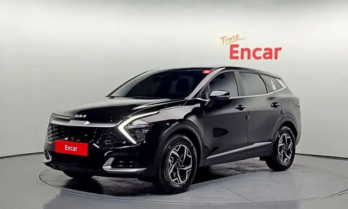 Kia Sportage — фото 1
