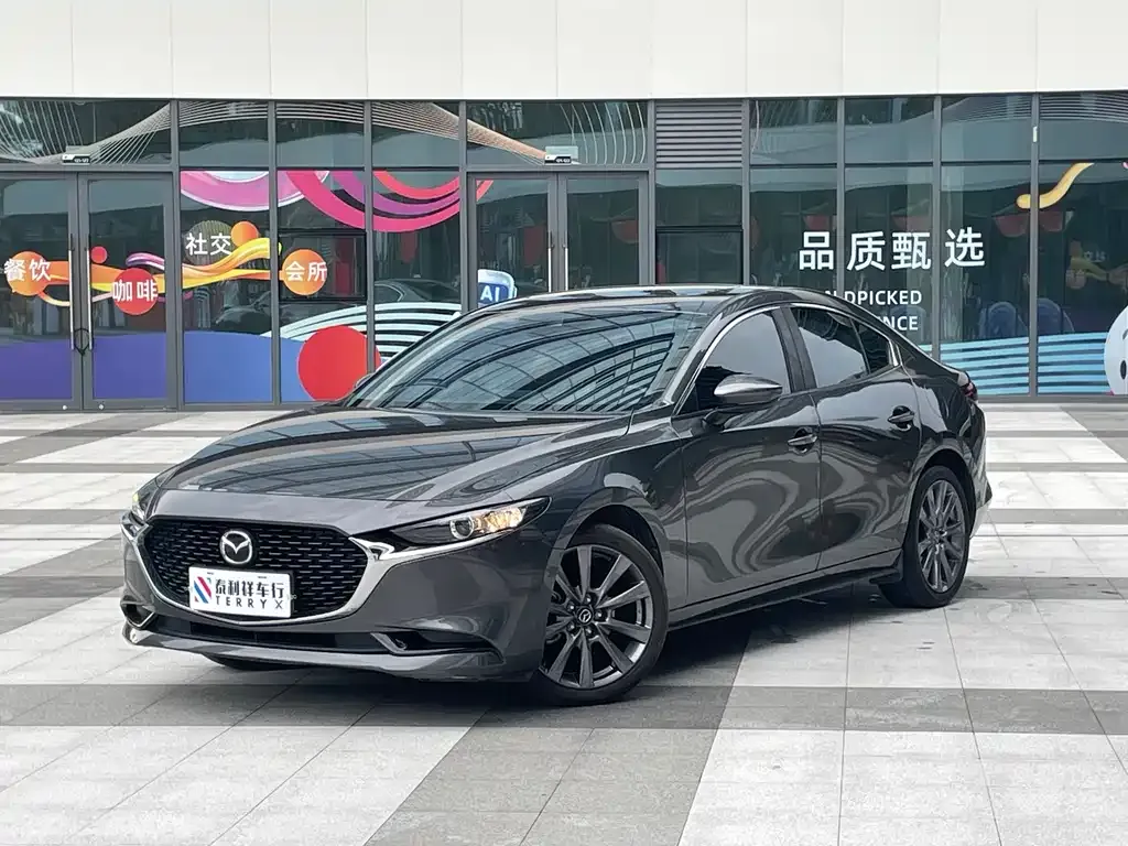 Mazda 3 Axela — фото 1