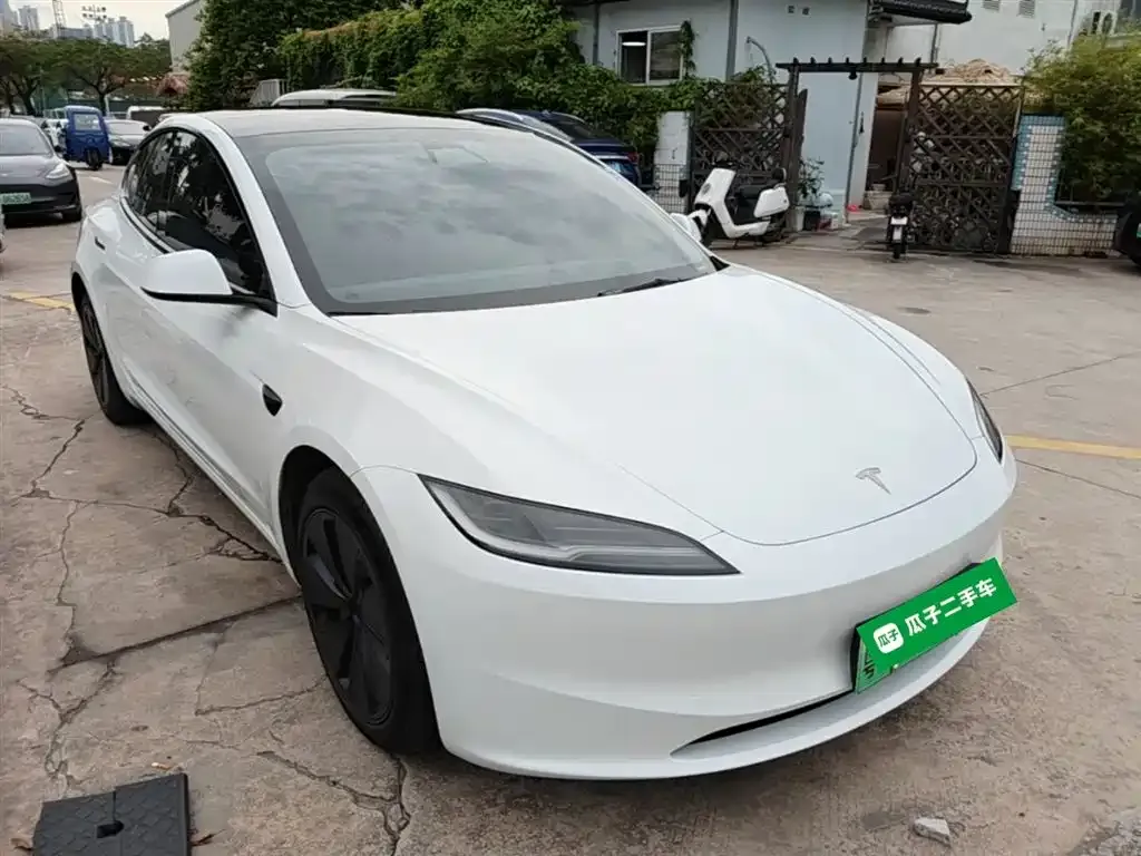 Tesla Model 3 — фото 7