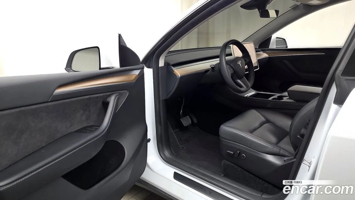 Tesla Model Y — фото 6