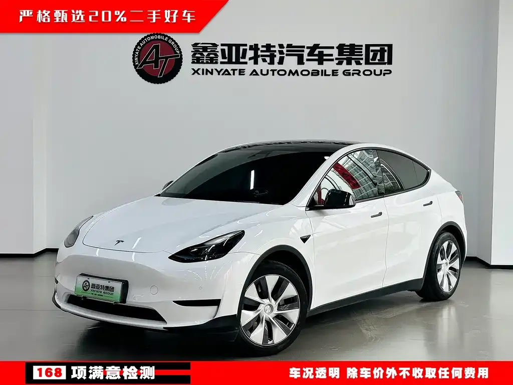 Tesla Model Y — фото 1