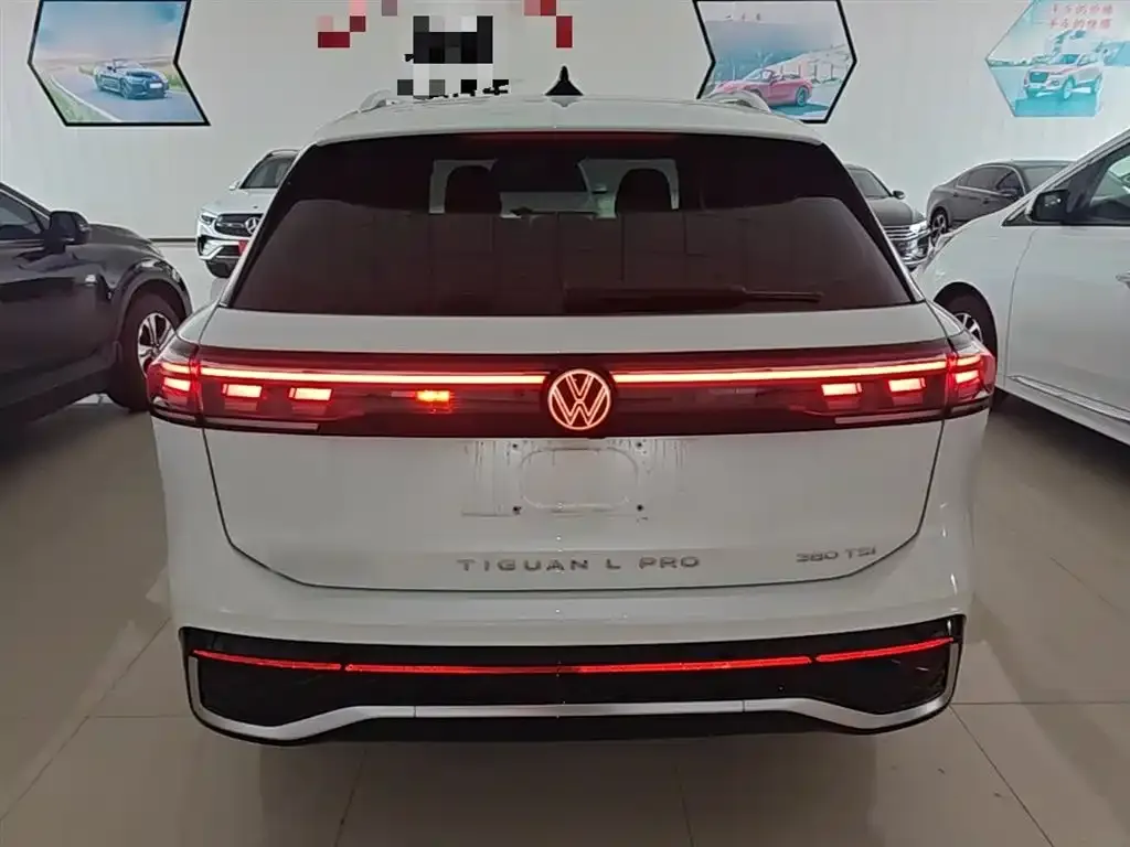 Volkswagen Tiguan L — фото 3