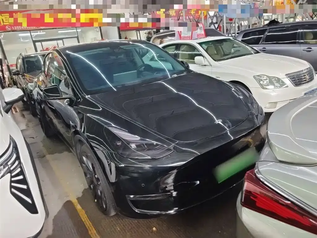 Tesla Model Y — фото 10