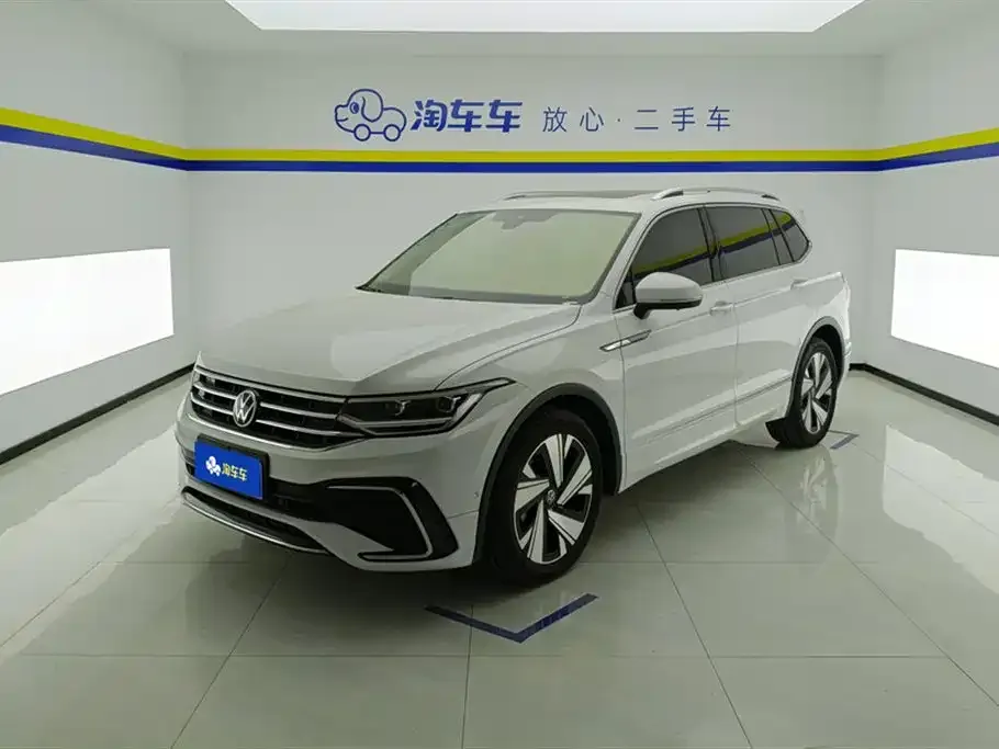 Volkswagen Tiguan L — фото 1
