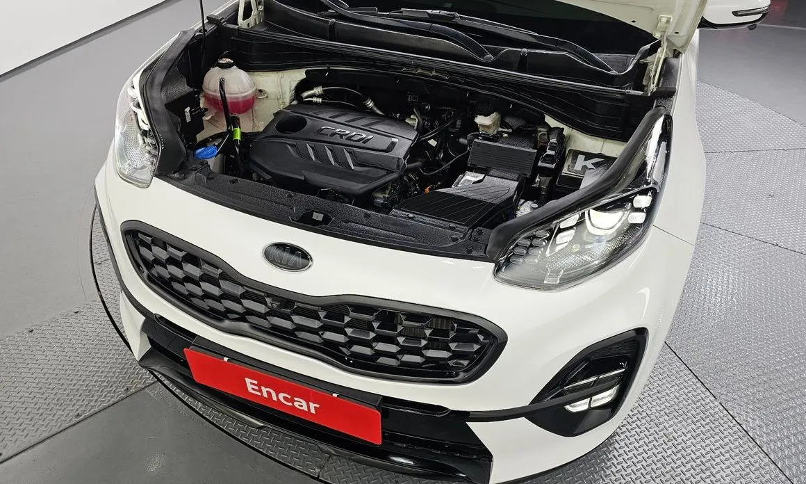 Kia Sportage — фото 10