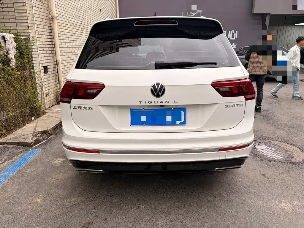 Volkswagen Tiguan L — фото 10
