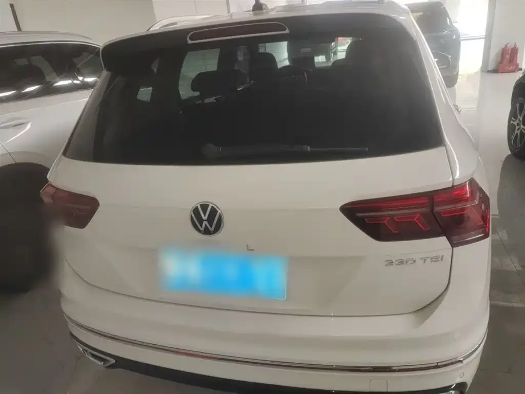 Volkswagen Tiguan L — фото 2