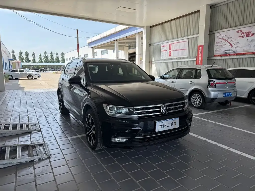 Volkswagen Tiguan L — фото 7
