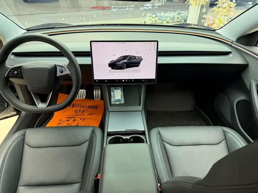 Tesla Model 3 — фото 10