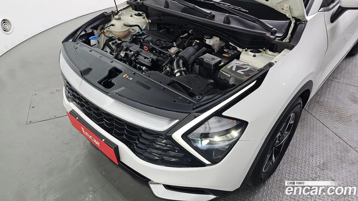 Kia Sportage — фото 10