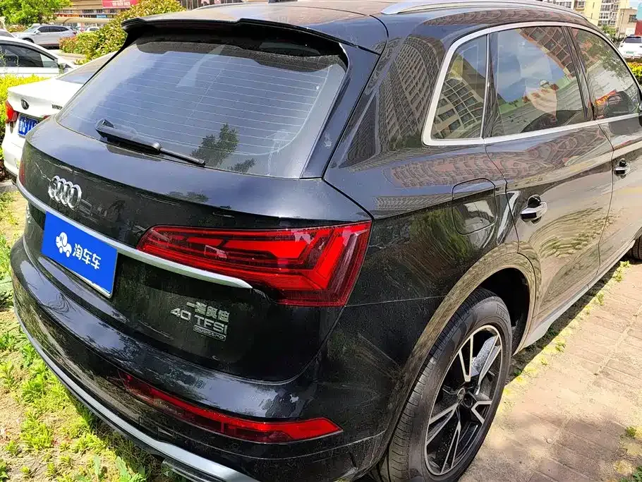 Audi Q5L — фото 10