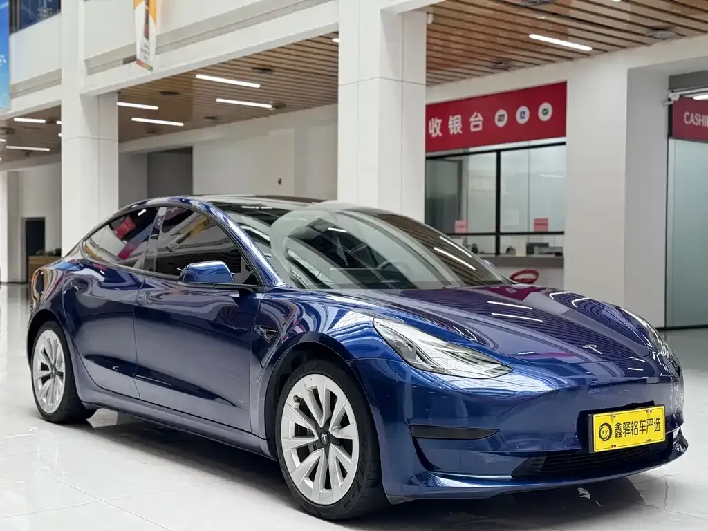 Tesla Model 3 — фото 5