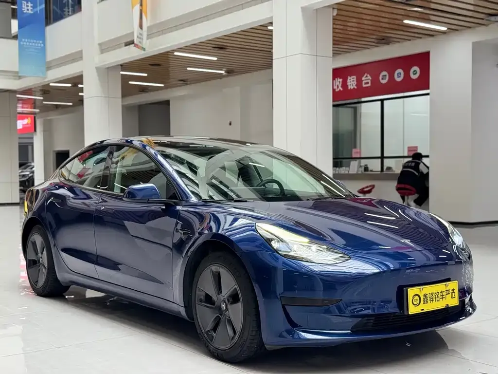 Tesla Model 3 — фото 8